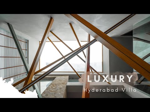 Inside a Luxurious villa in Hyderabad that experiments with a huge ceiling installation.