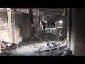 Group of displaced Palestinians move into heavily damaged school in Gaza that was run by UN agency - Video
