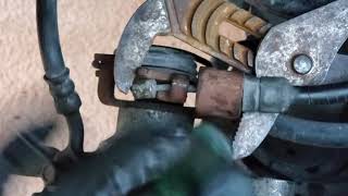 Removing parking brake line from caliper on Chevy Malibu 2008-2012 Fast and Easy