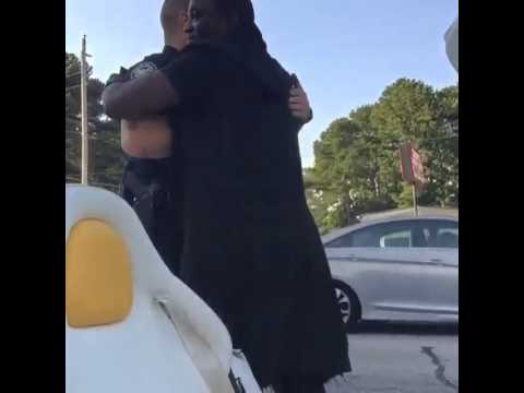 Police taking photos with AKON