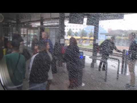 People Getting Off and On the Train at Vejle Station, Denmark