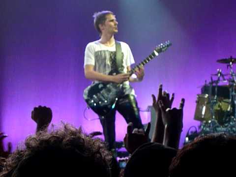 Matt Bellamy from Muse shredding on guitar