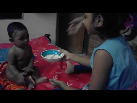 Manha is trying to take meal from her beloved sister Mehzabeen Mahi