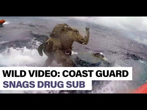 RAW USA Coast Guard Leaps onto Submarine Drug Smugglers seizing stock pile of Cocaine 2019 News Video