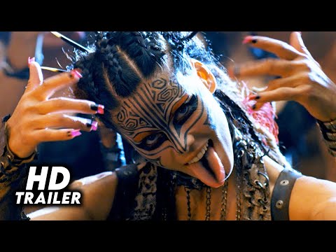 Doomsday trailer frame: marauder crowd roaring around a makeshift stage under floodlights