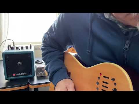 Playing guitar with Phil Jones Nanobass  X4C
