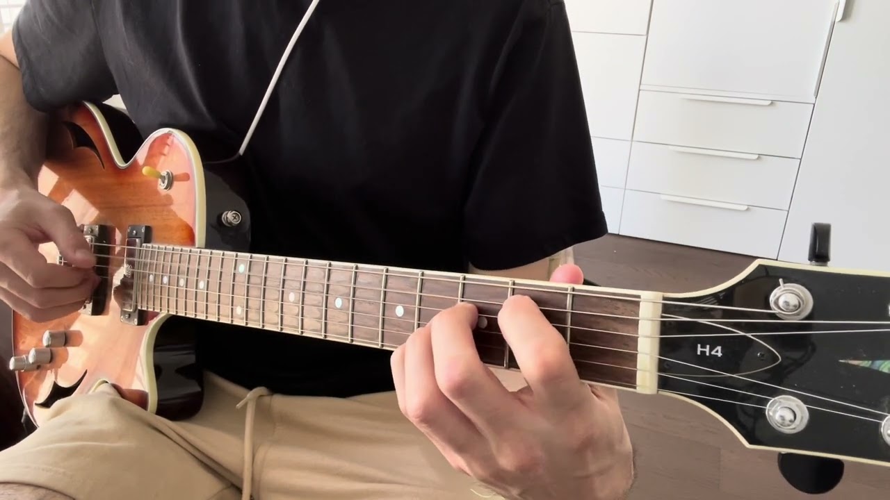 Guitar close-up demonstrating fingerstyle bossa nova comping over the jazz standard Blue Bossa
