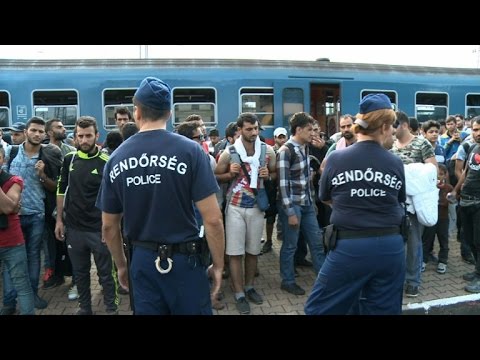 Migrants arrive in Austria from Hungary