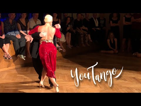  Alejandra Mantinan  and  Aoniken Quiroga  are  dancing  to  the  tango  "  Yo tambien  "  by  Juan D'Arienzo  at  Munich International Tango Festival  in  2019