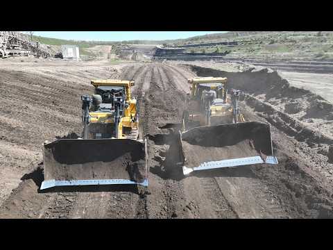 Two Cat D9T Bulldozers Rehabilitating & Building A Road On Old Mine - 4K Drone View