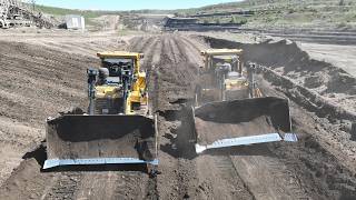 Two Cat D9T Bulldozers Rehabilitating & Building A Road On Old Mine - 4K Drone View