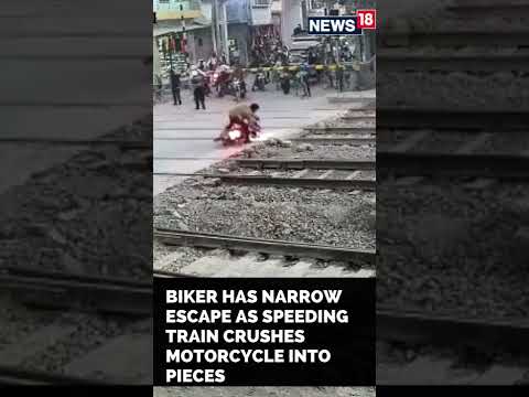 Bike Train Accident News | Biker Escapes Deadly Train Accident | 