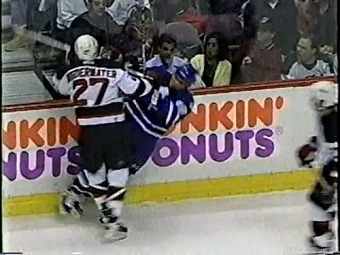 Scott Niedermayer crosschecks Tie Domi