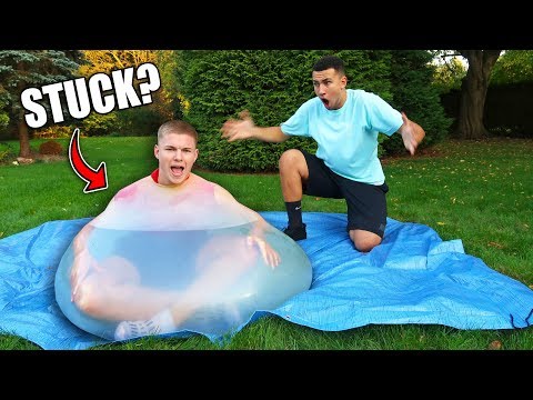 HE GOT TRAPPED INSIDE A GIANT 6ft WATER BALLOON...