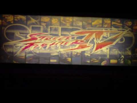 Moeking - Girl getting down on Super Street Fighter 4 Arcade Machine