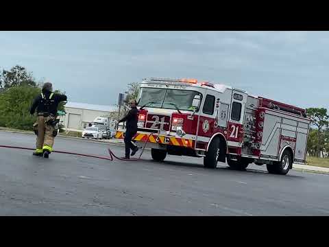 Sarasota county engine 21 arriving on scene of dumpster fire.