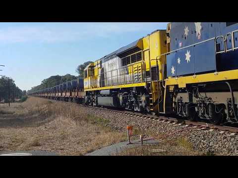 Steel Train flying through Springhurst - Australian Trains