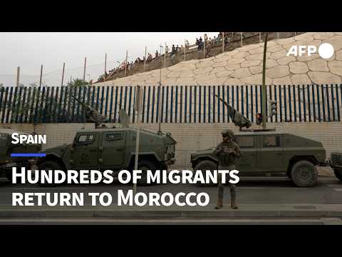 Video Thumbnail: Hundreds of migrants return to Morocco after crossing into Spanish enclave | AFP