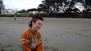 preview picture of video 'Funny Dog on Orewa Beach -  New Zealand'