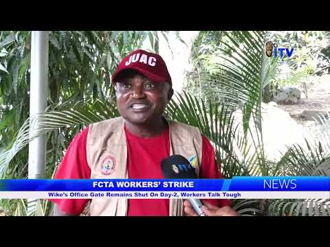 FCTA WORKERS' STRIKE: Wike's Office Gate Remains Shut On Day-2, Workers Talk Tough