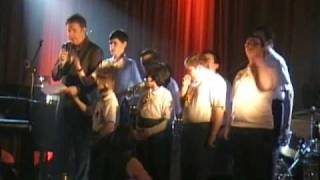 Liam Lawton with Drumcar students sing There is Something Greath.wmv