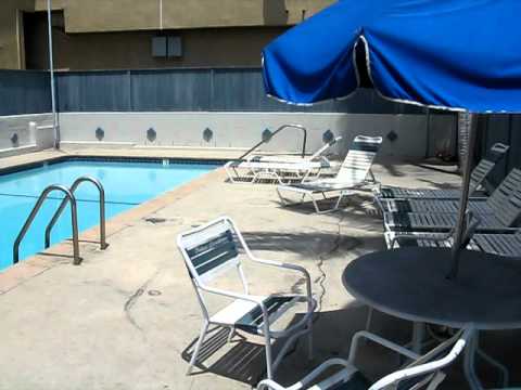 palms pool and parking lot.AVI