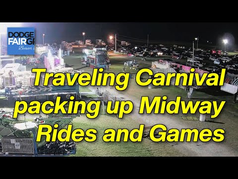 Traveling Carnival Packing Up Midway Rides and Games