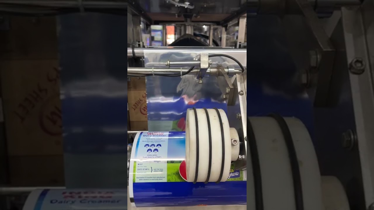 MILK POWDER PACKING MACHINE