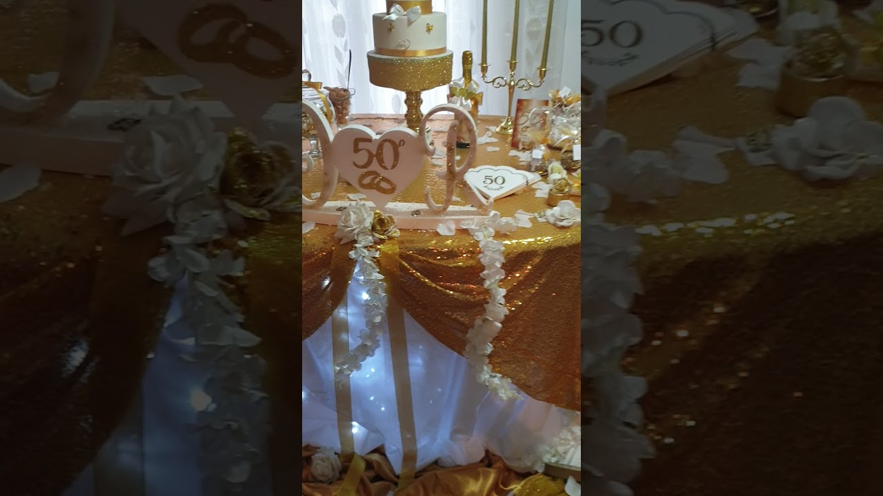 Allestimento tavolo torta Nozze d'oro