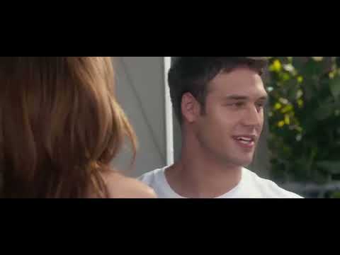 Trailer cutaway: headlights cutting through rain toward a rural barn