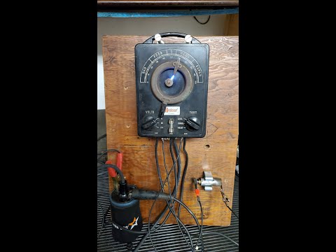 A demostration showing the effect of a bad condenser on an ignition  coil's spark