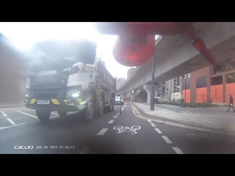 Muck Away Wagon Attempts To Left Hook Cyclist But Backs Out At The Last Minute
