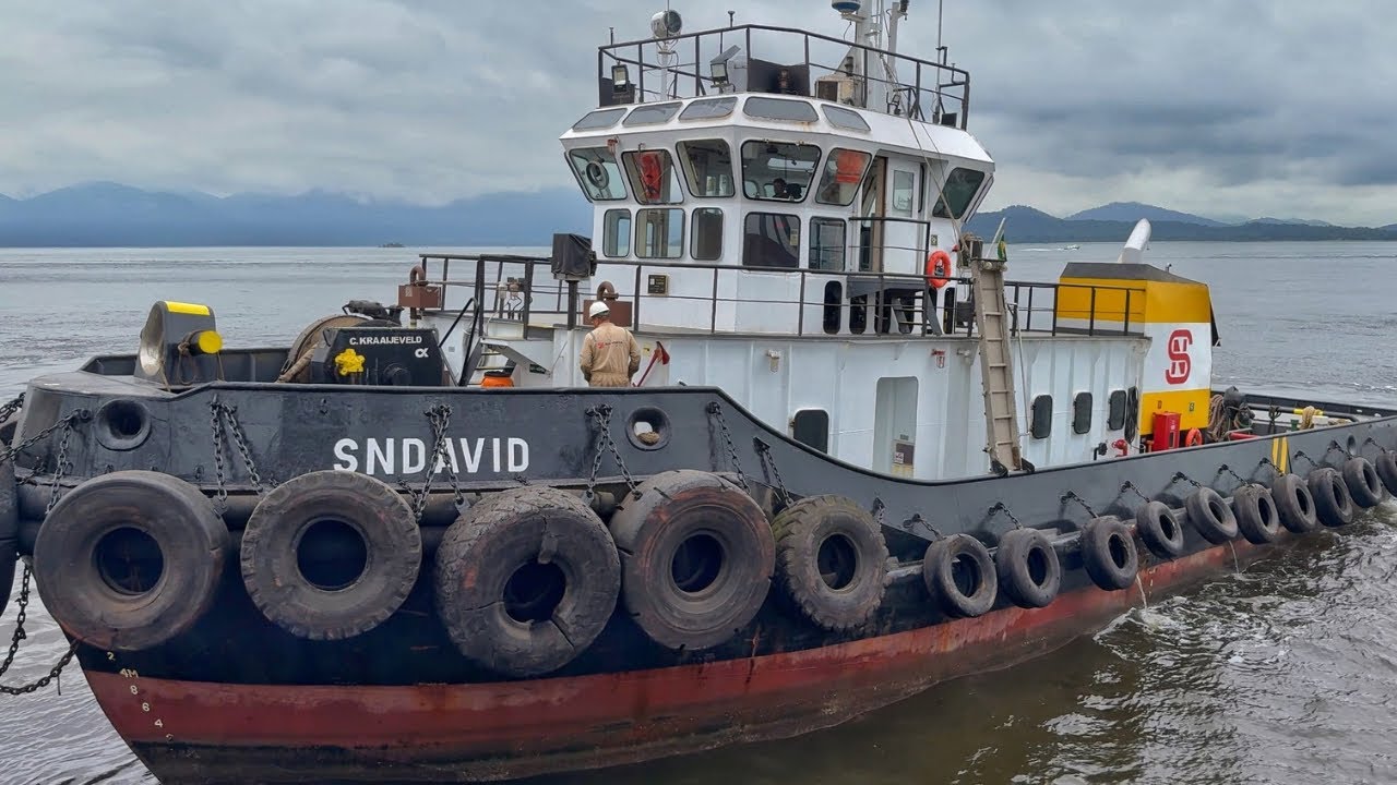 ON BOARD a TUGBOAT moving huge SHIPS