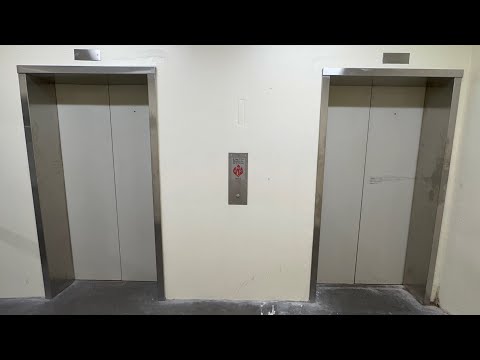 Two SLOW Dover Hydraulic Elevators in the State East Parking Garage in Downtown Lincoln, Nebraska 