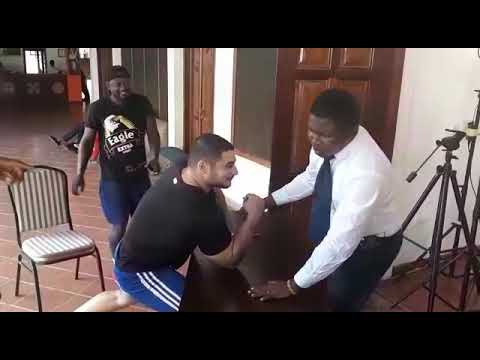 Judge Louis Lamis in a Hand Wrestling Competition