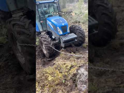 HE TIED THE TRACTOR WHEEL TO A TREE