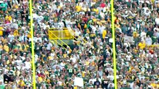 Aaron Rodgers runs in a touchdown and does a Lambeau Leap, Green Bay, WI, 9/19/2010