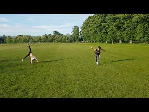 Twin girls practicing the cartwheel #shorts #cartwheel
