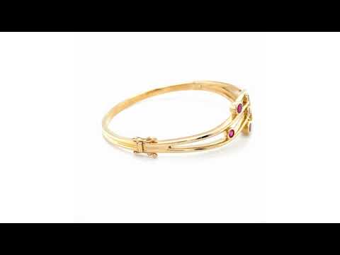 9ct Yellow Gold Ruby Wavy Bangle - 05440019 | Johnsons Jewellers
