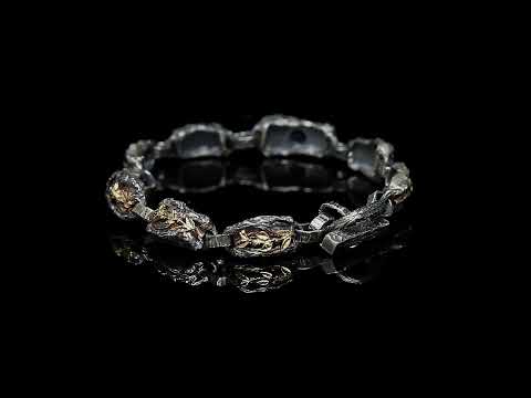Power of Life — bracelet made of oxidized silver and yellow gold with garnet