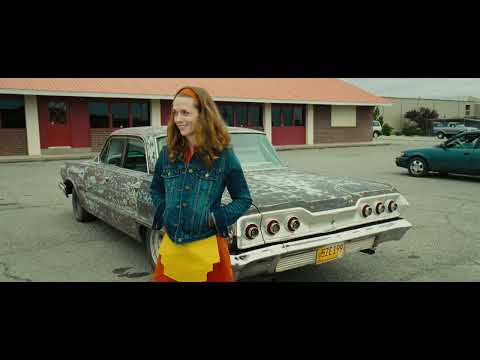 This Must Be the Place (2012 US release) trailer still: Cheyenne in white makeup crossing a Dublin street