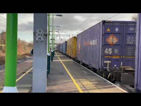 90037 and 90021 Pass Acton Bridge with Containers 21st December 2022