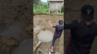 Download lagu Looking for fish in the puddles of water from the drained pond mp3