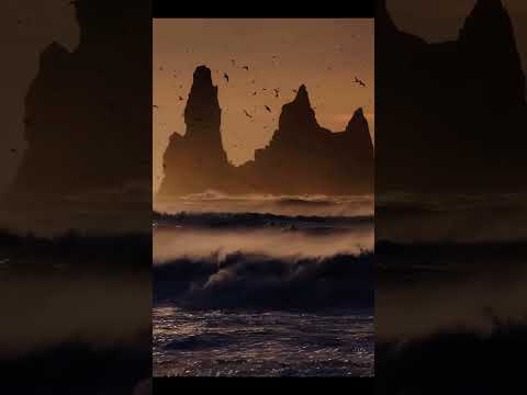 The dramatic beauty of a rugged and desolate mountain peak, with its snowy cap and rocky outcropping