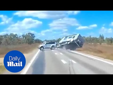Moment vehicle towing caravan loses control in horror Outback crash