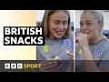 England's Lionesses try obscure British snacks | BBC Sport