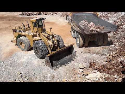 Caterpillar 992C Wheel Loader Loading Blasted Limestone On Caterpillar 777F Dumpers - Interkat SA