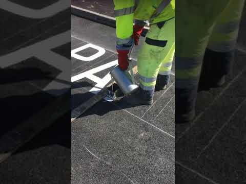 Hand lay thermoplastic screed road markings the old fashioned way