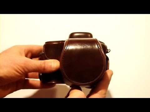 UNPACKING OF A LEATHER LOOKING FULL AND HALF CASE FOR THE OLYMPUS E-PL5