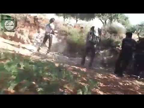 اشتباكات بين جبهة الإنقاذ الإسلامية وقوات النظام اثناء تحرير مستودعات خطاب في ريف حماة